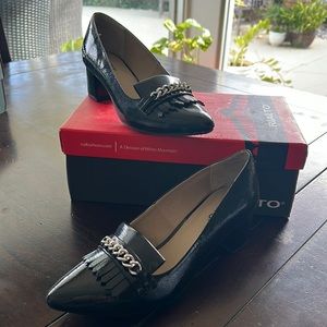 New, never worn patent heel.